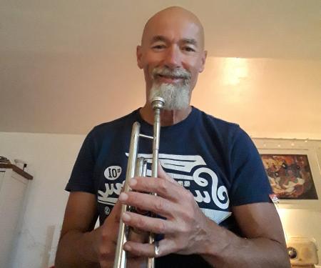 Nofel Nawras playing an intrument
